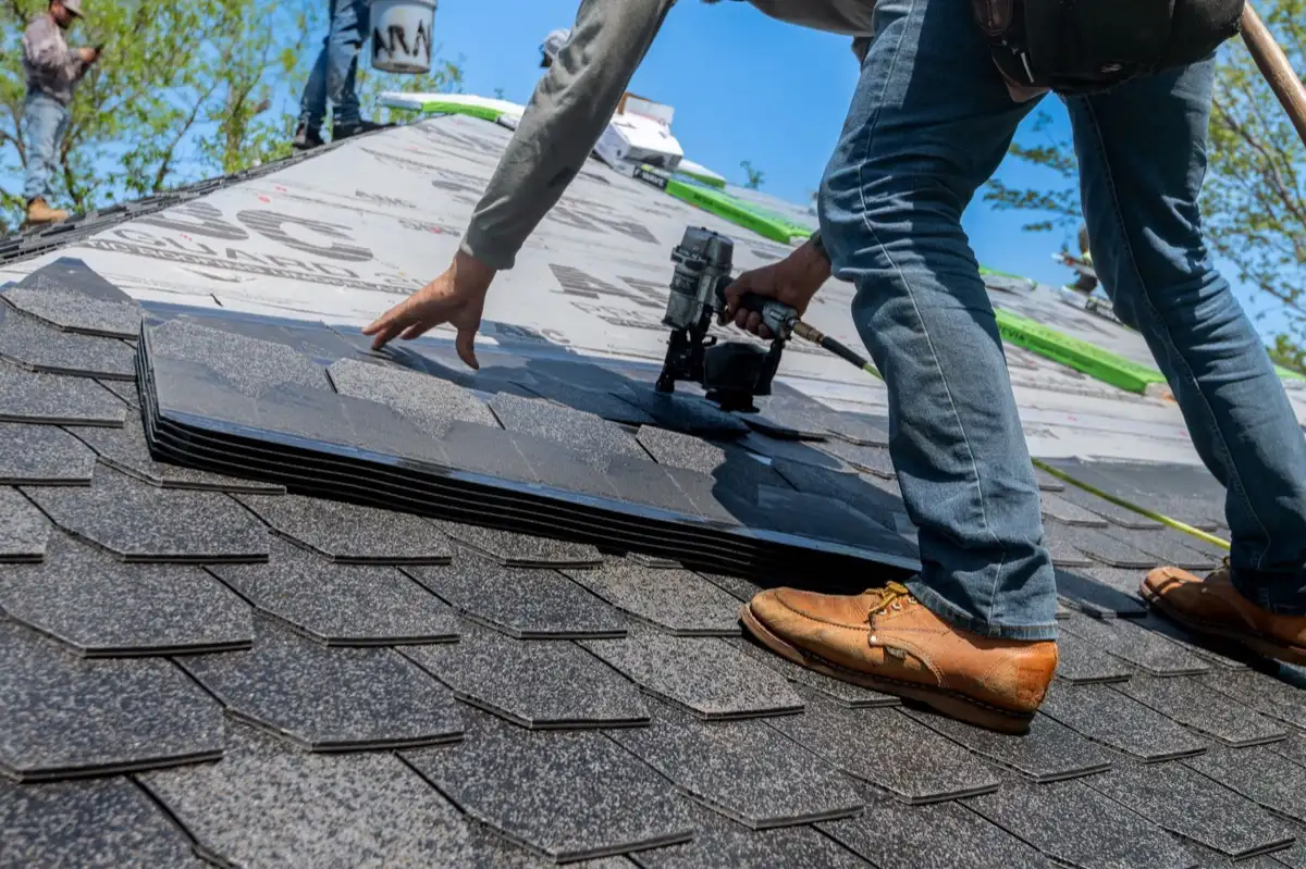 Inspecting an asphalt shingle slope after a hailstorm in Salinas, CA