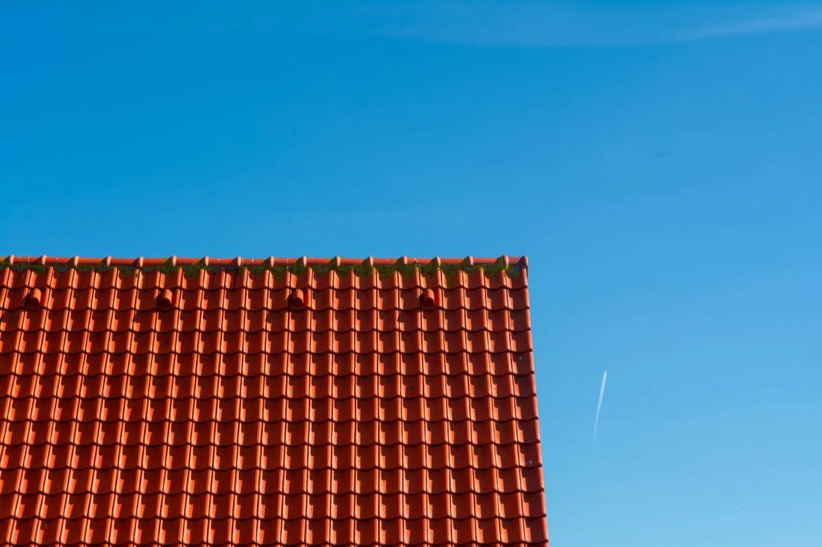 Tile roof gable in full sun, the kind of exposure that sets roof life in Salinas, CA
